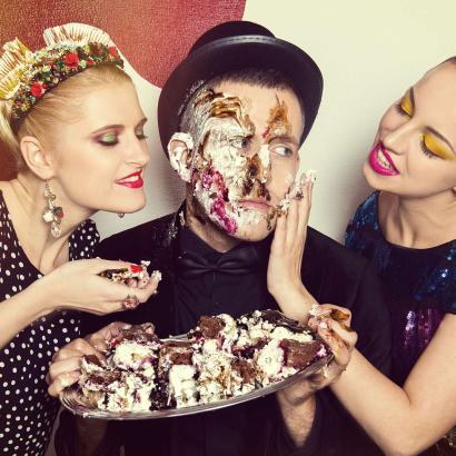 Stag party chaos with pie-splattered faces and whipped cream flying through the air in Berlin